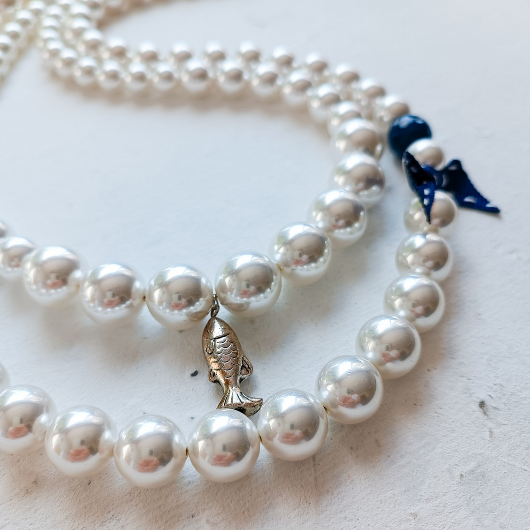 Algunas perlas y un pez azul