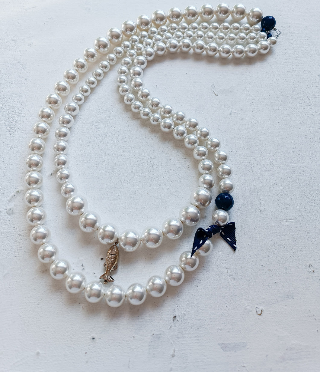 Algunas perlas y un pez azul